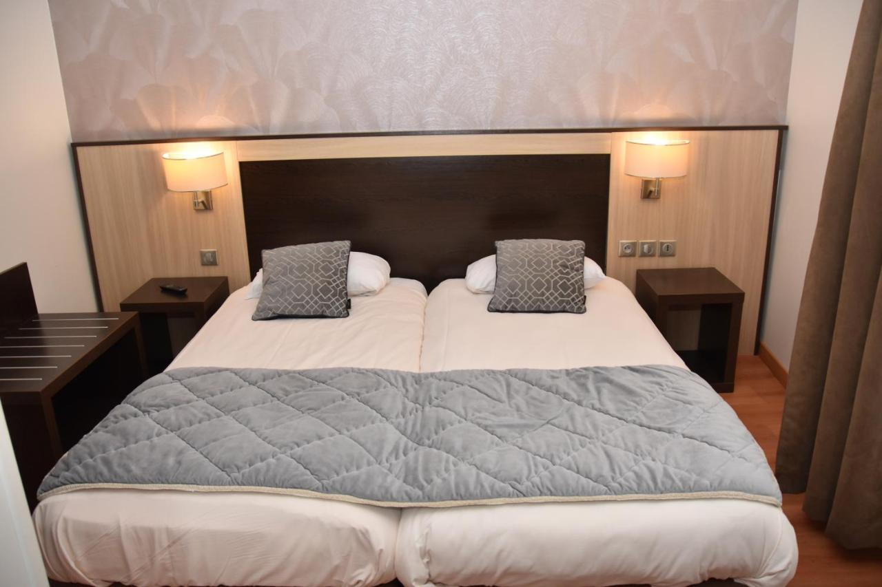 Hotel Le Coureau แซ็ง-โทรจง-เลส์-แบ็งส์ ห้อง รูปภาพ