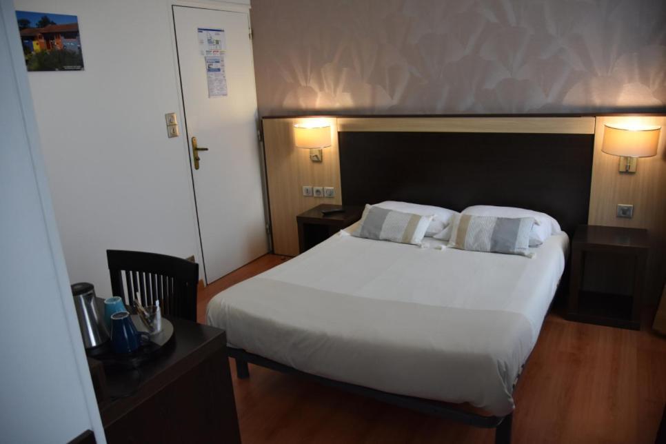 Hotel Le Coureau แซ็ง-โทรจง-เลส์-แบ็งส์ ห้อง รูปภาพ