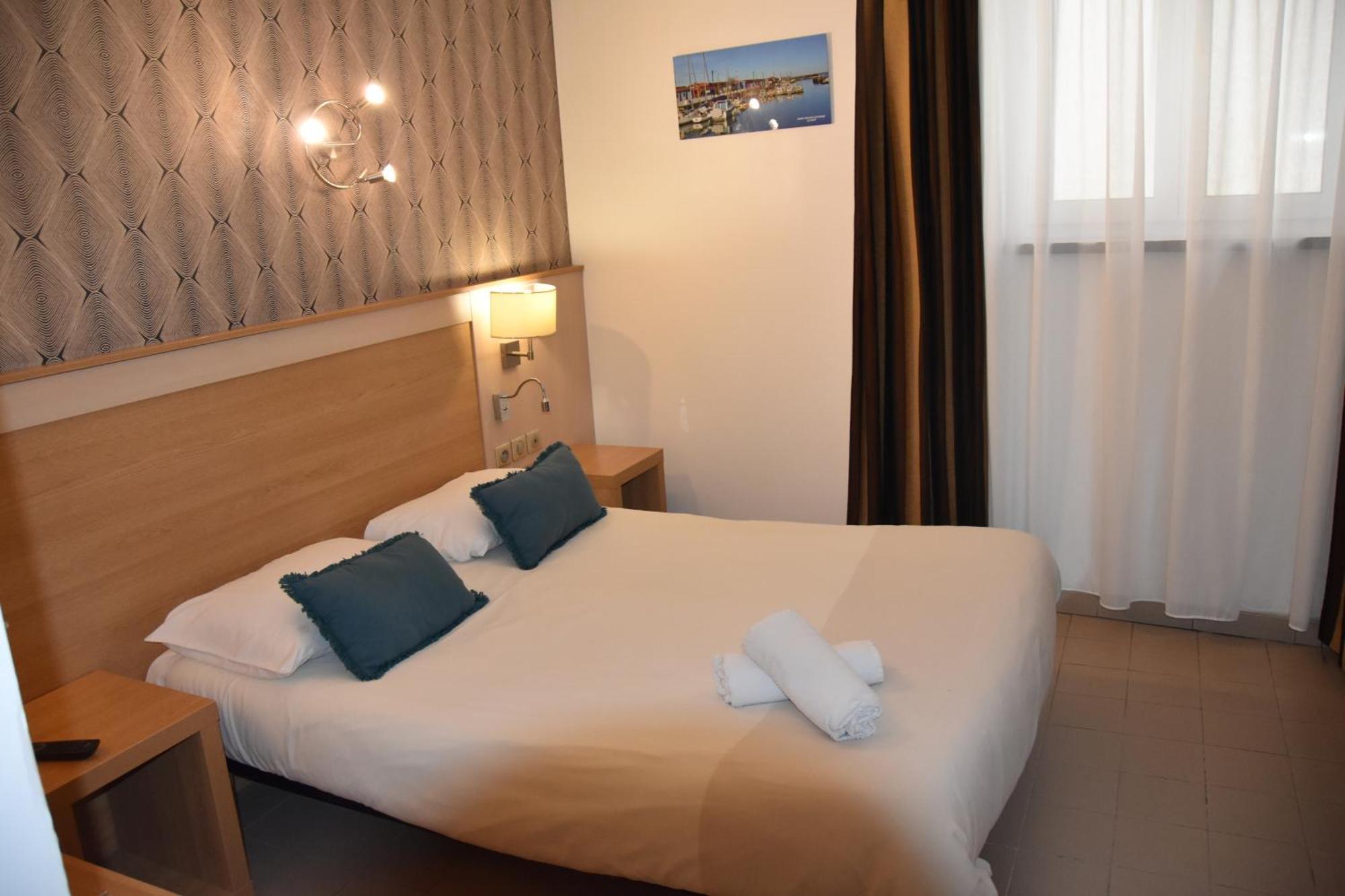 Hotel Le Coureau แซ็ง-โทรจง-เลส์-แบ็งส์ ห้อง รูปภาพ